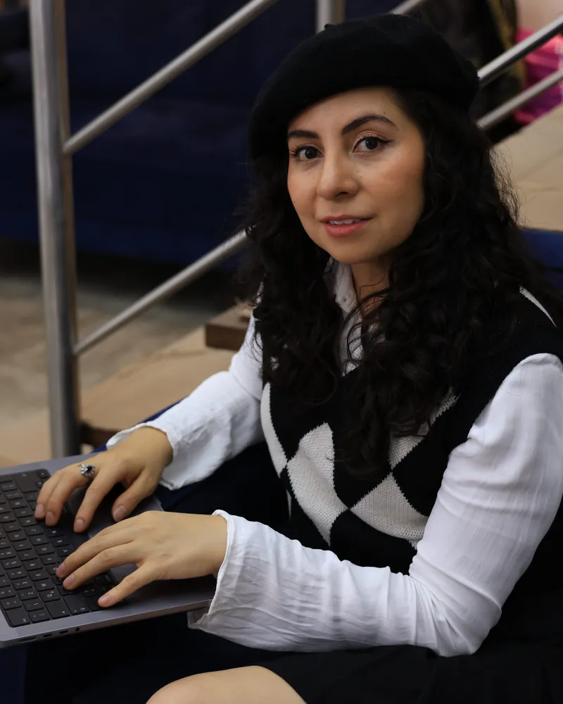 Virtual assistant working on a laptop